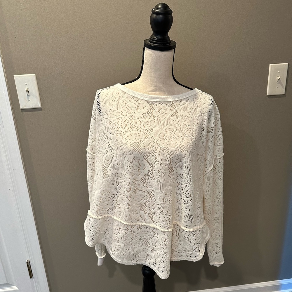 Free People lace oversized long sleeve top. NWOT. Beautiful stitching.